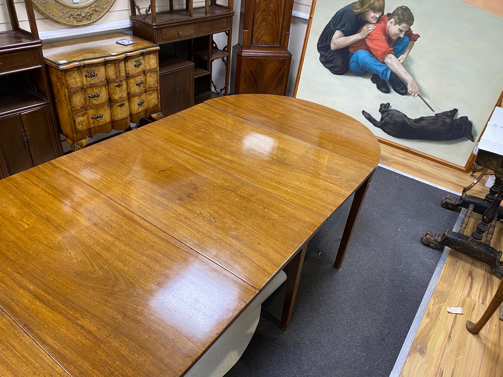 A George III mahogany extending D end dining table, 240cm extended, depth 105cm, height 70cm